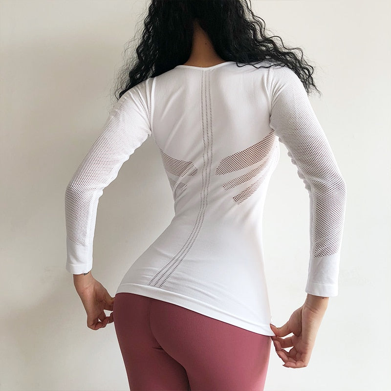 young lady
 exciting body-building playing
 t-shirt longer
 sleeves exercise tee black smooth and continuous
 moving
 shirt yoga top Gym clothes