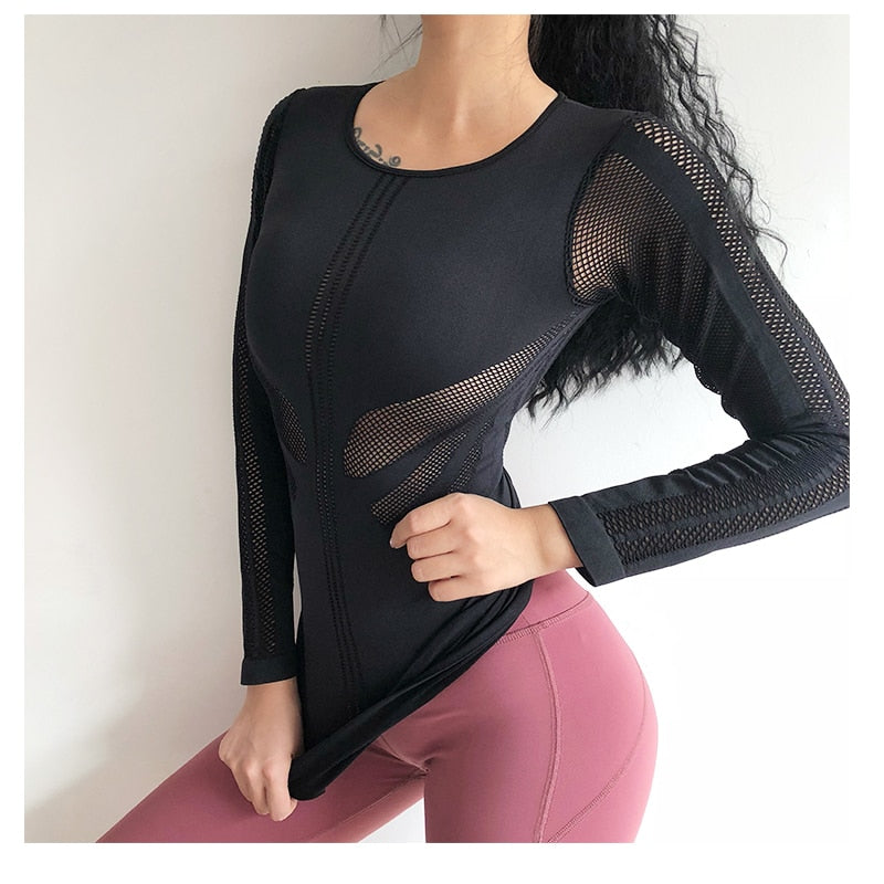 young lady
 exciting body-building playing
 t-shirt longer
 sleeves exercise tee black smooth and continuous
 moving
 shirt yoga top Gym clothes
