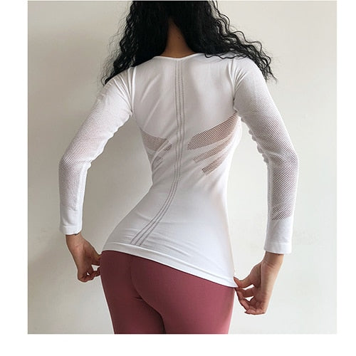 young lady
 exciting body-building playing
 t-shirt longer
 sleeves exercise tee black smooth and continuous
 moving
 shirt yoga top Gym clothes